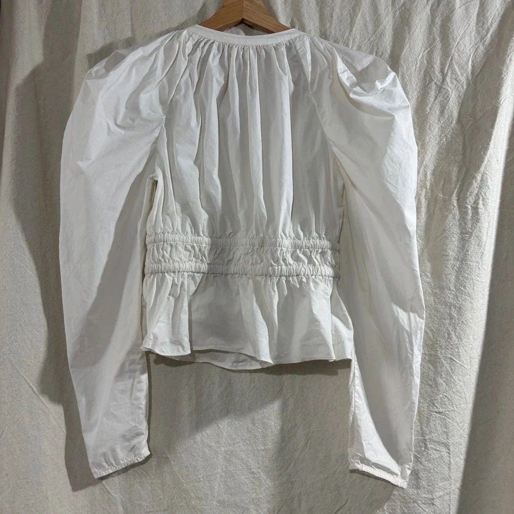 Ulla Johnson Pre-Fall 2022 White Cotton Puff Sleeve Smocked Peplum Blouse 4